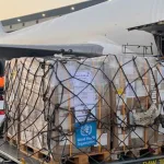 Dubai Humanitarian Cargo loading in a flight